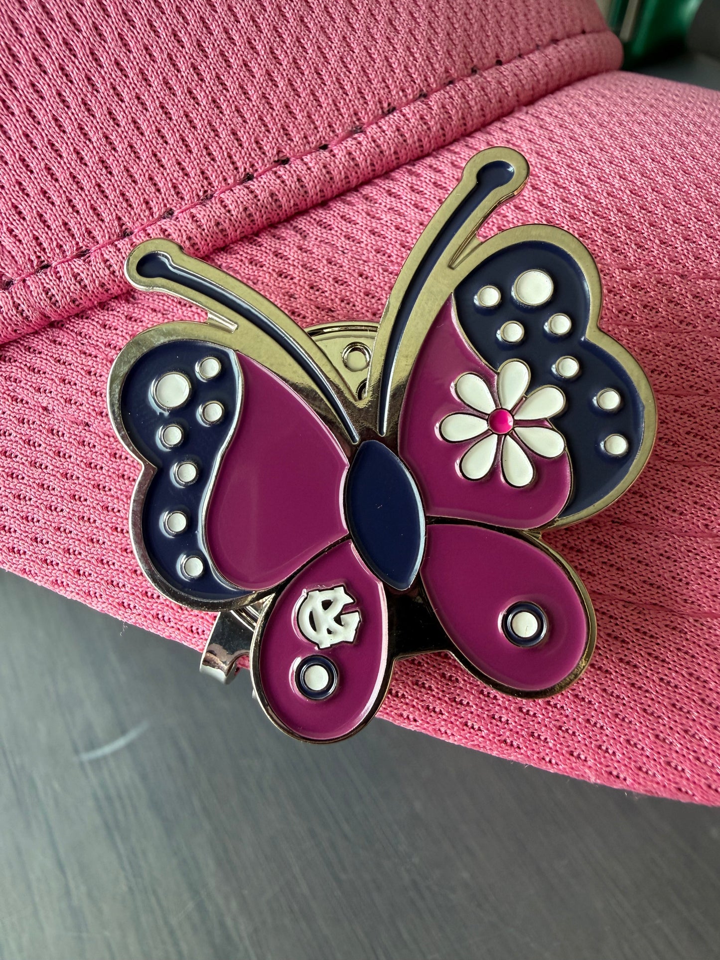 Butterfly ball markers with Hat Clips included.